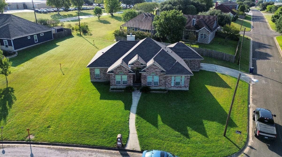 Brick home with new architectural shingle roof
